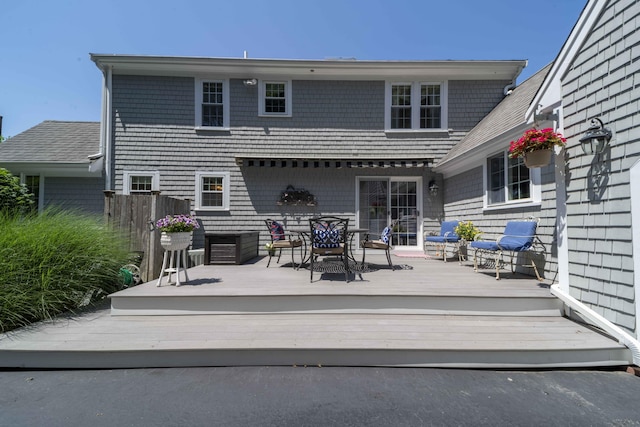 4 Square Rigger Ln, Hyannis, MA 02601 - rear view of house with a deck and outdoor dining space