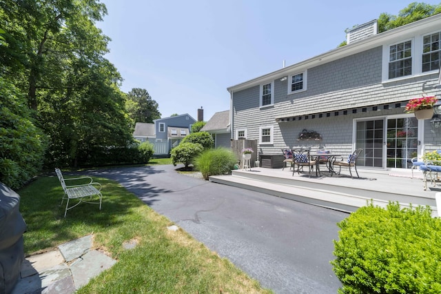 4 Square Rigger Ln, Hyannis, MA 02601 - back of property with a wooden deck