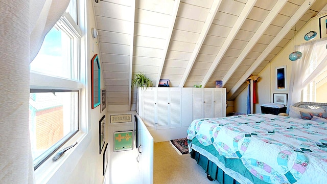 bedroom with wooden ceiling, multiple windows, and lofted ceiling with beams