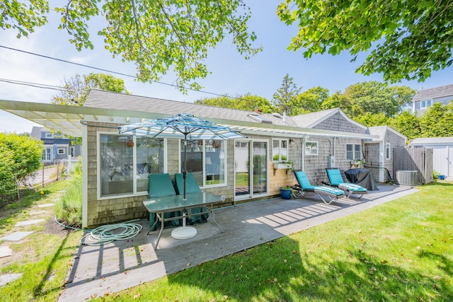 5 Highland Ln, Harwich Port, MA 02646 - back of property with a patio area