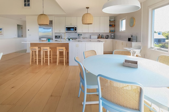 dining room featuring light hardwood / wood-style flooring