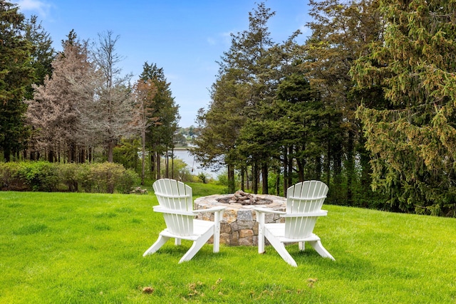 46 Freeman Ln, Orleans, MA 02653 - view of grassy yard featuring an outdoor fire pit