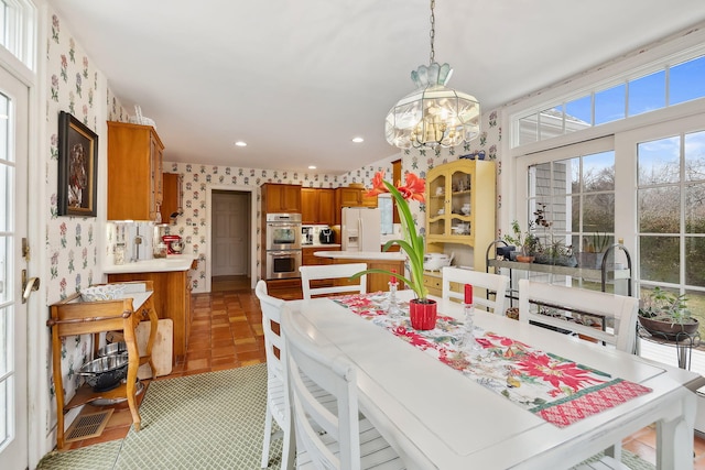 46 Freeman Ln, Orleans, MA 02653 - dining room featuring wallpapered walls, a chandelier, and recessed lighting