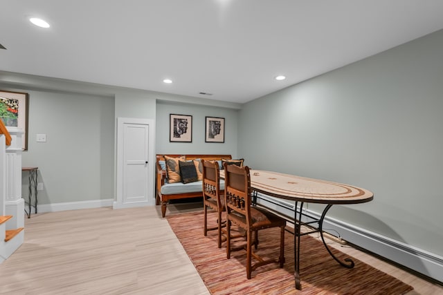 dining room with light hardwood / wood-style flooring