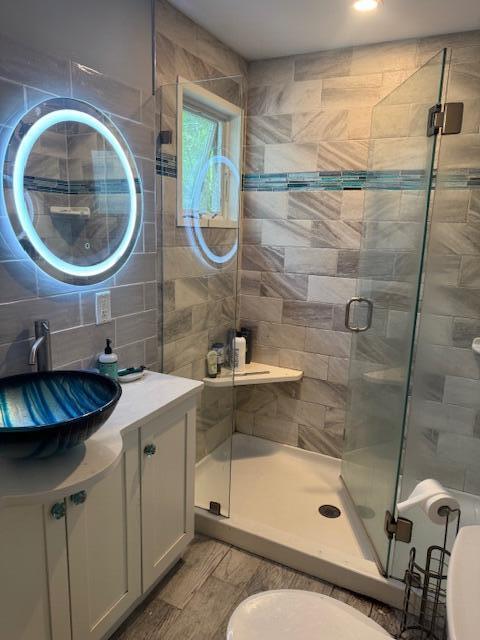 155 Mitchells Way, Barnstable, MA 02601 - full bath with a stall shower, vanity, and tile walls