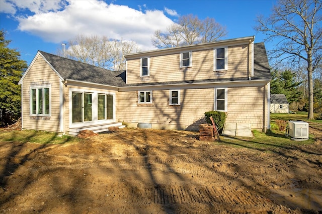 4 Inkberry Cir, Sandwich, MA 02563 - back of property featuring roof with shingles