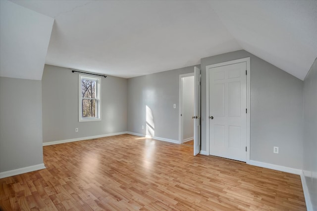 4 Inkberry Cir, Sandwich, MA 02563 - bonus room featuring light wood-style flooring, baseboards, and lofted ceiling