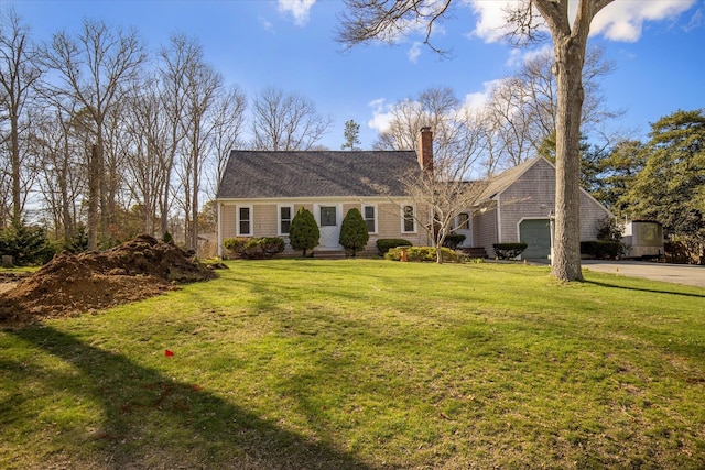 4 Inkberry Cir, Sandwich, MA 02563 - view of front of home featuring a chimney, an attached garage, aphalt driveway, a front yard, and a shingled roof