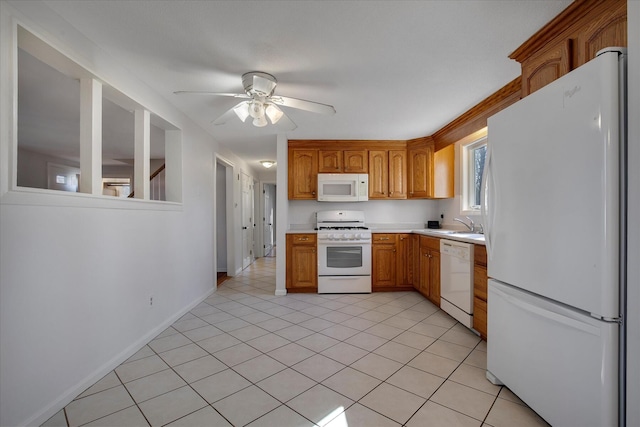 4 Inkberry Cir, Sandwich, MA 02563 - kitchen featuring baseboards, light countertops, a ceiling fan, white appliances, and brown cabinets