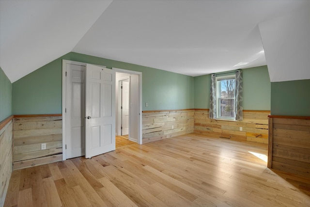 4 Inkberry Cir, Sandwich, MA 02563 - bonus room featuring wood walls, a wainscoted wall, wood finished floors, and lofted ceiling