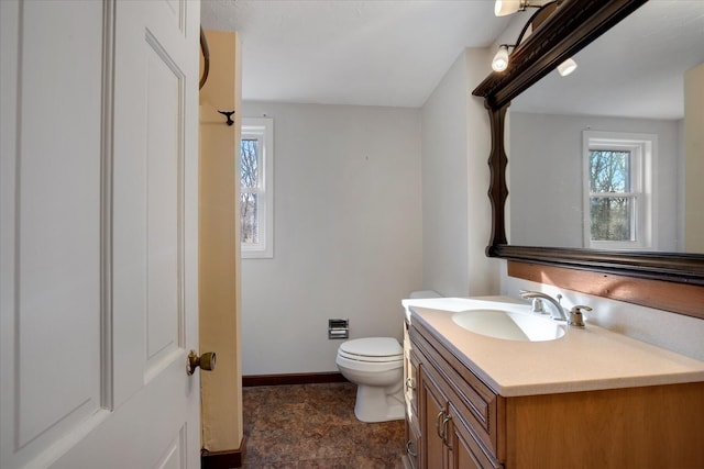4 Inkberry Cir, Sandwich, MA 02563 - bathroom featuring toilet, vanity, and baseboards