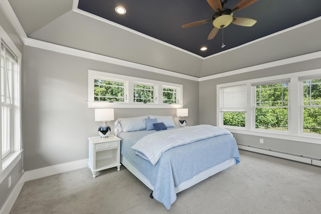 carpeted bedroom featuring a baseboard radiator, vaulted ceiling, ceiling fan, and ornamental molding