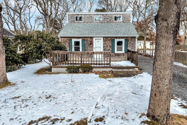 front facade featuring a wooden deck