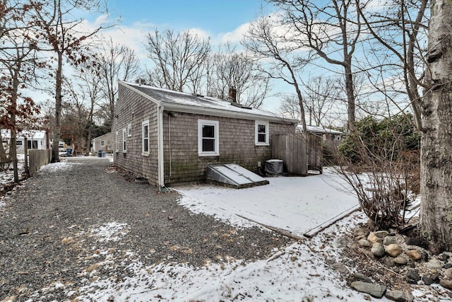 view of snow covered house