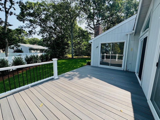 deck featuring a yard