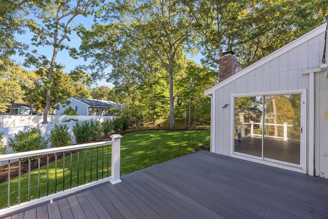 deck featuring a lawn