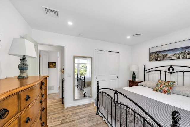39 Nehoiden Rd, Mashpee, MA 02649 - bedroom with light wood-style floors, a closet, recessed lighting, and baseboards