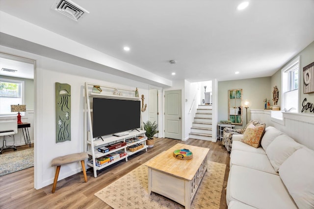 39 Nehoiden Rd, Mashpee, MA 02649 - living room with healthy amount of natural light, stairway, light wood-type flooring, and recessed lighting