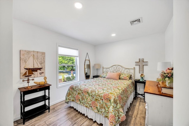 39 Nehoiden Rd, Mashpee, MA 02649 - bedroom featuring wood finished floors, recessed lighting, and baseboards