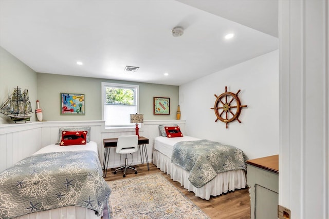 39 Nehoiden Rd, Mashpee, MA 02649 - bedroom featuring wood finished floors, recessed lighting, and a wainscoted wall