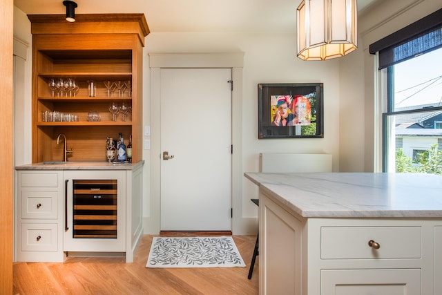 3 Carver Ct, Provincetown, MA 02657 - indoor wet bar featuring beverage cooler and light wood-style flooring