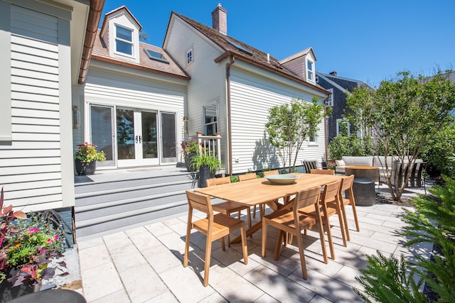 3 Carver Ct, Provincetown, MA 02657 - view of patio with outdoor dining area and an outdoor living space