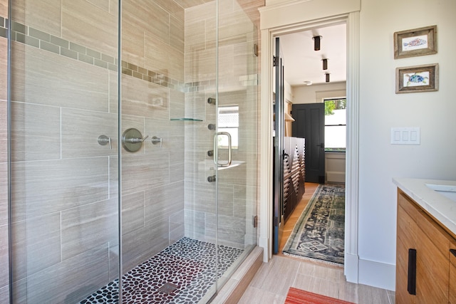 3 Carver Ct, Provincetown, MA 02657 - bathroom featuring vanity, a stall shower, and tile patterned floors