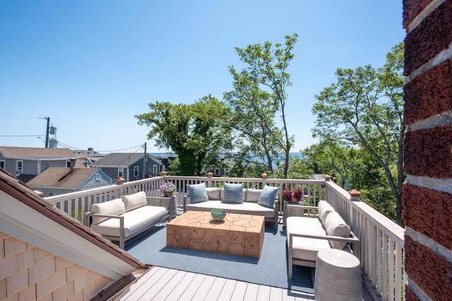 3 Carver Ct, Provincetown, MA 02657 - wooden deck with an outdoor living space