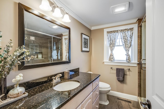 bathroom with vanity, baseboards, visible vents, ornamental molding, and a shower stall