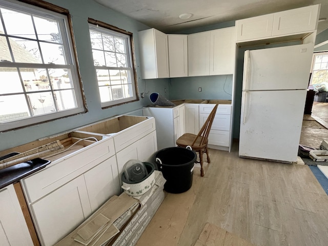 100 Parkwood Dr, Wareham, MA 02571 - laundry room with light wood-style floors
