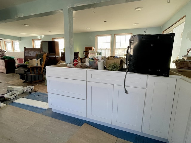 100 Parkwood Dr, Wareham, MA 02571 - kitchen featuring open floor plan, white cabinetry, and recessed lighting