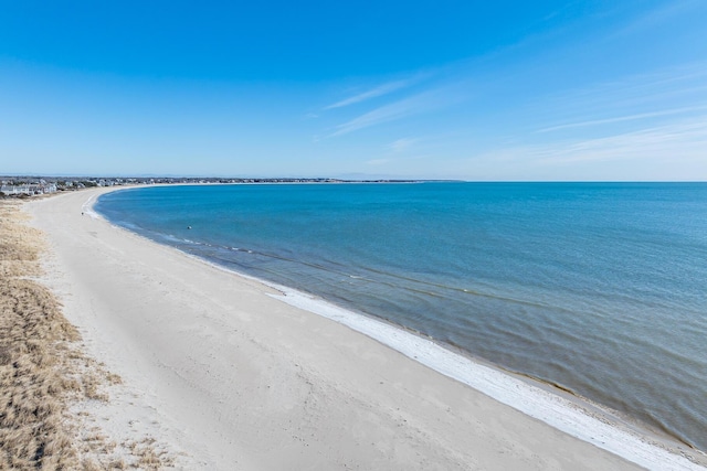 view of water feature with a beach view