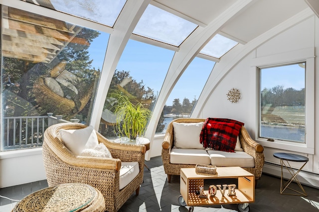 sunroom featuring a baseboard radiator