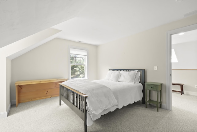 21 Pine St Unit 1Au, North Falmouth, MA 02556 - carpeted bedroom with lofted ceiling and baseboards