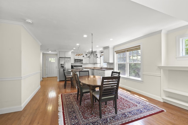 21 Pine St Unit 1Au, North Falmouth, MA 02556 - dining room featuring light wood-type flooring, ornamental molding, recessed lighting, and a chandelier