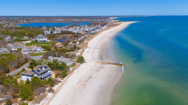 bird's eye view with a beach view and a water view