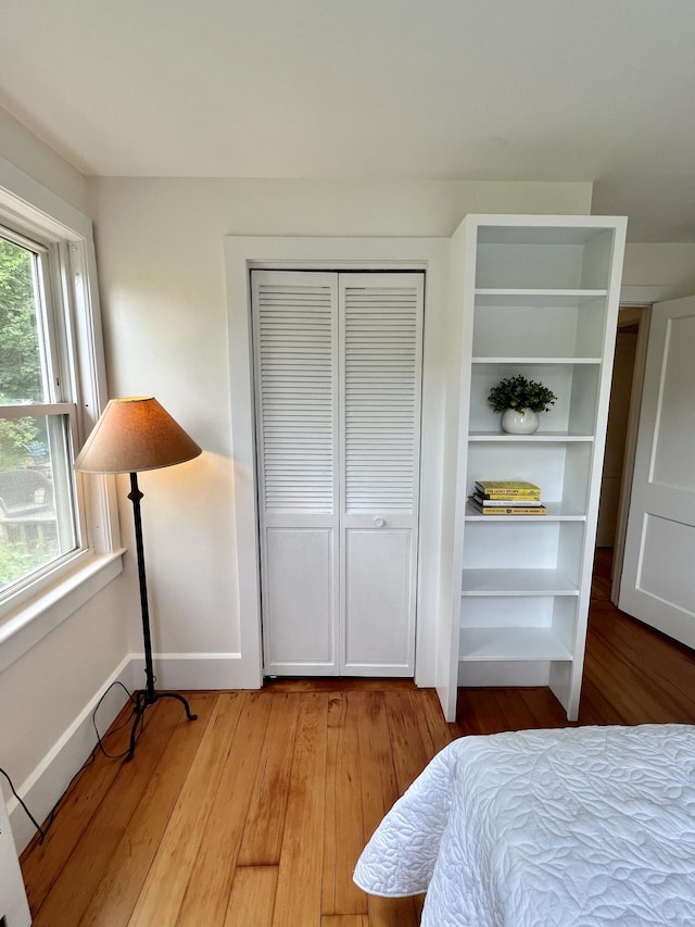 27 Long View Dr, Orleans, MA 02653 - bedroom with a closet, light wood finished floors, and baseboards