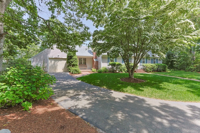 21 Gramps Way S, Chatham, MA 02659 - view of front of property with asphalt driveway, a front lawn, and a garage