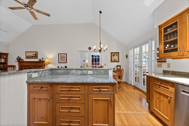 21 Gramps Way S, Chatham, MA 02659 - kitchen featuring stainless steel dishwasher, french doors, lofted ceiling, light wood-style flooring, and glass insert cabinets
