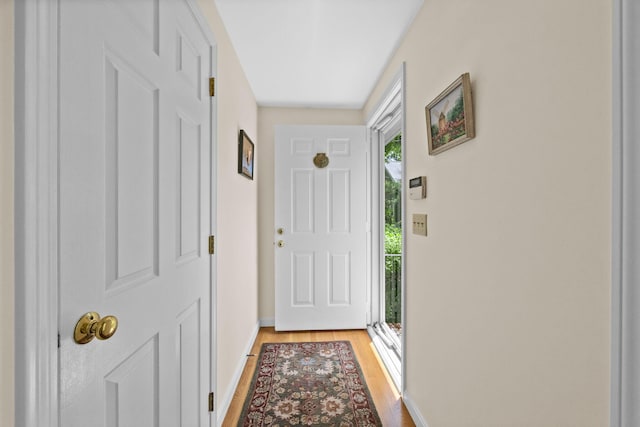 21 Gramps Way S, Chatham, MA 02659 - entryway with light wood-type flooring and baseboards