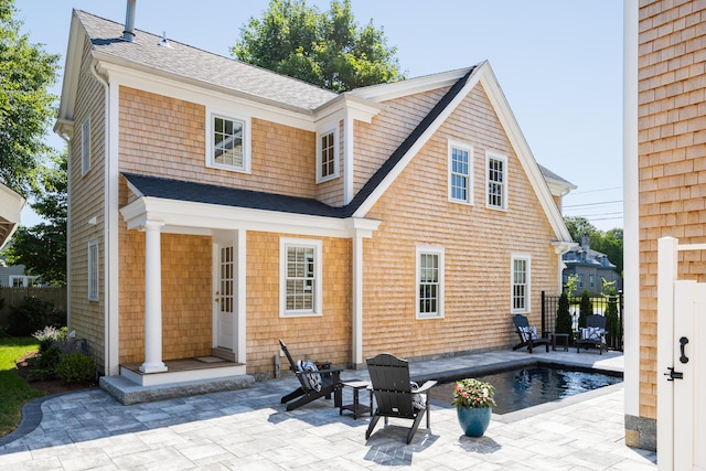 rear view of property with a patio area