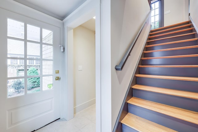 staircase with tile patterned flooring