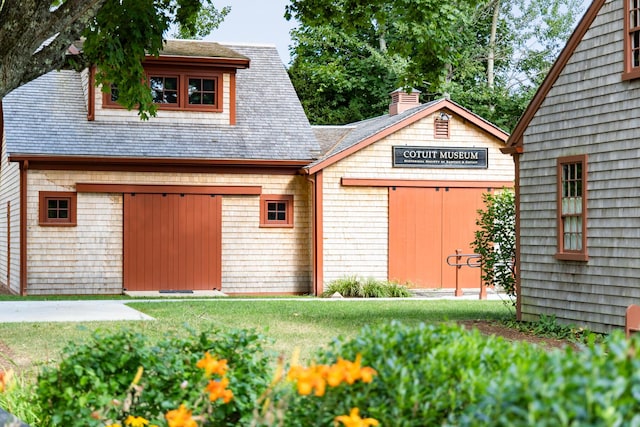 exterior space featuring a front yard