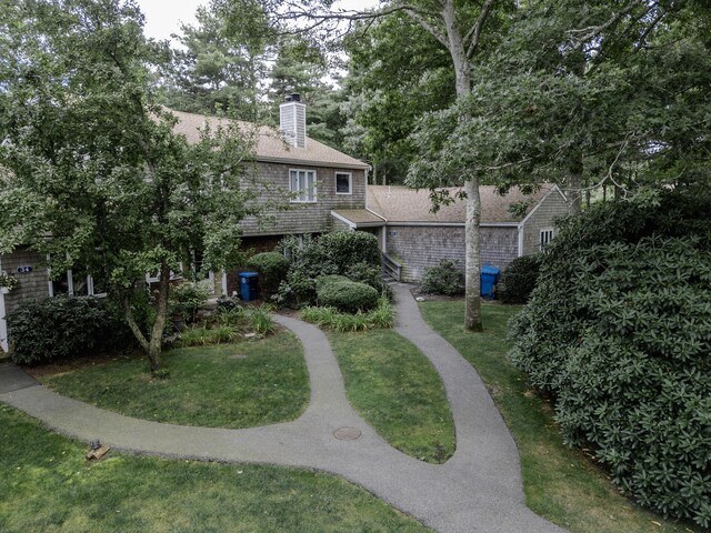 view of community with a lawn