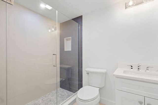 2 Little Cove Ln, Orleans, MA 02653 - bathroom featuring toilet, vanity, and a shower stall
