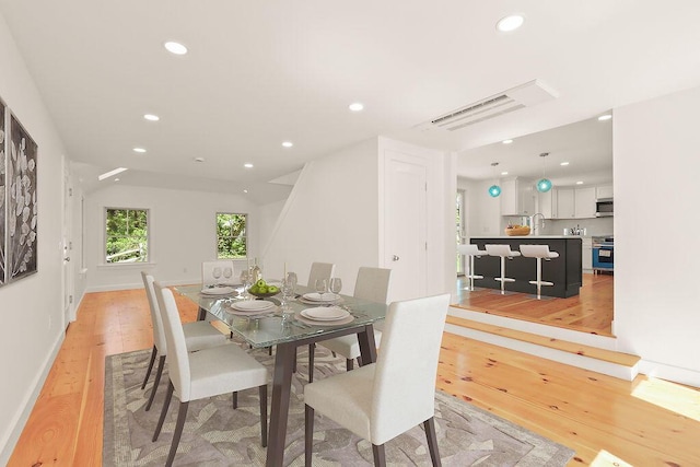 2 Little Cove Ln, Orleans, MA 02653 - dining area featuring light wood-style floors, recessed lighting, and baseboards