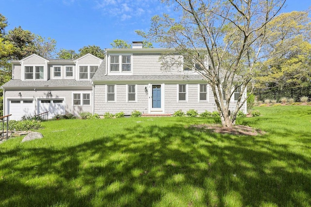 2 Little Cove Ln, Orleans, MA 02653 - view of front of home with a chimney, an attached garage, and roof with shingles