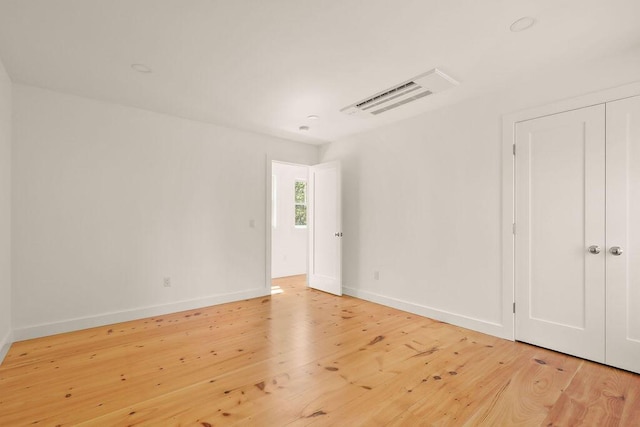 2 Little Cove Ln, Orleans, MA 02653 - unfurnished bedroom featuring light wood-style flooring and baseboards