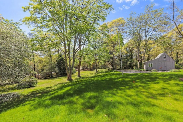 2 Little Cove Ln, Orleans, MA 02653 - view of green lawn featuring an outdoor structure