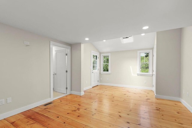 2 Little Cove Ln, Orleans, MA 02653 - spare room featuring light wood-style floors, baseboards, lofted ceiling, and recessed lighting